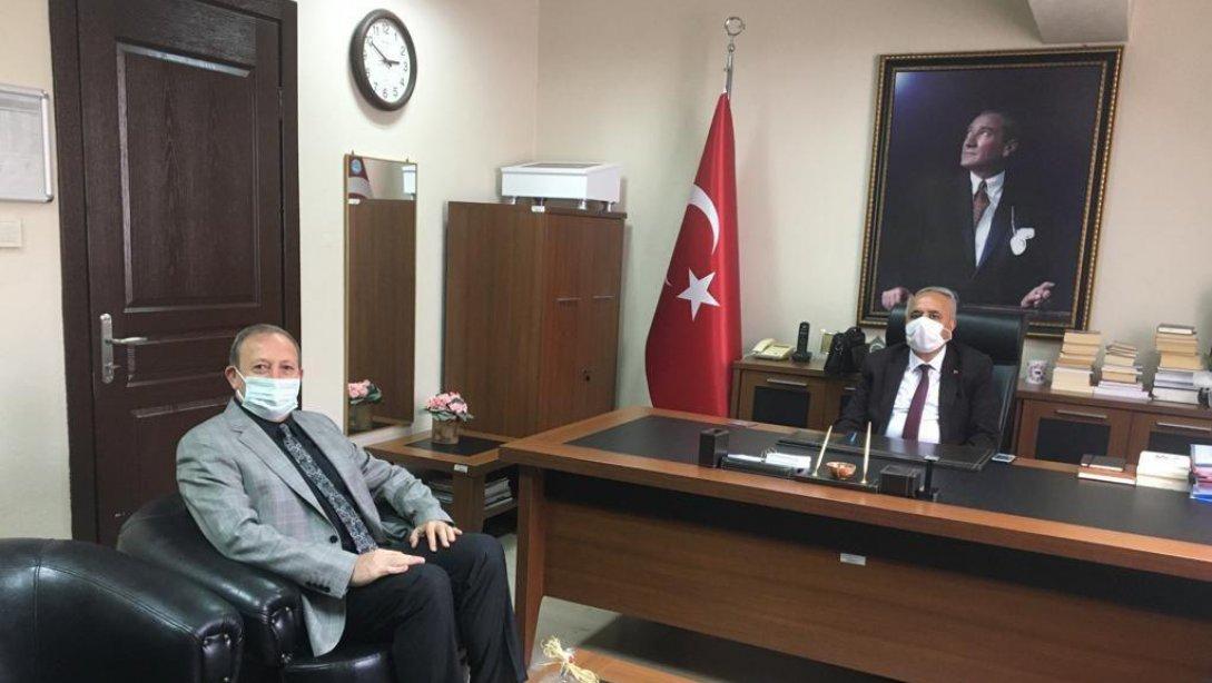 Turgutlu Sosyal Hizmet İlçe Müdürü Suudi Arslan İlçe Milli Eğitim Müdürü Mehmet ÖLMEZ'i ziyarete geldi.